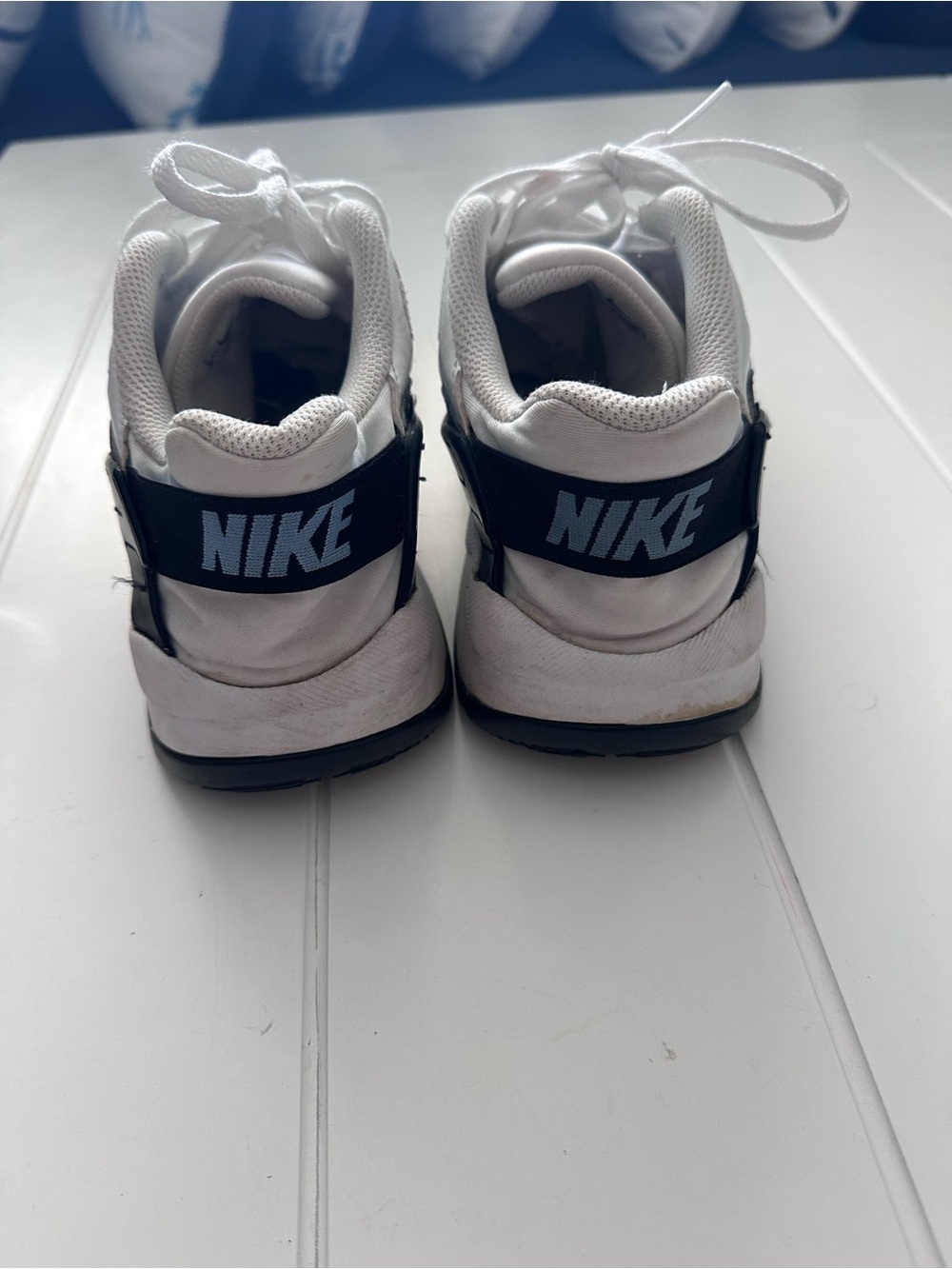 Nike White Sneakers with Black Swoosh Accent - Picture 3 of 5